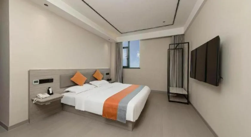 Bed in Shell Hotel Suzhou Zhangjiagang Jingang Town Central Plaza