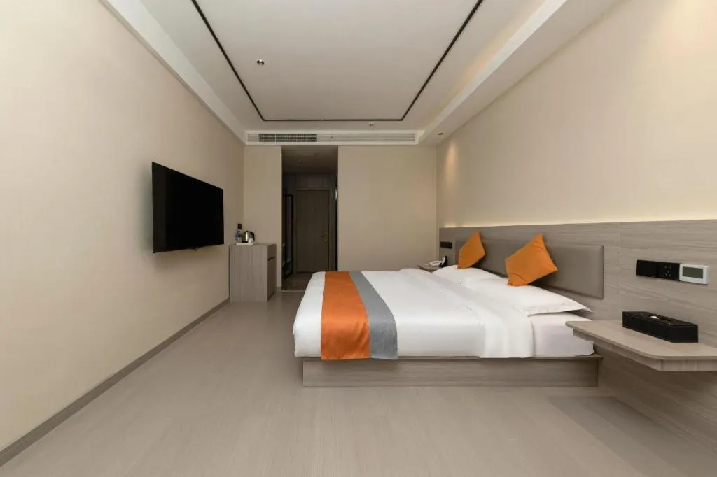 Bed in Shell Hotel Suzhou Zhangjiagang Jingang Town Central Plaza