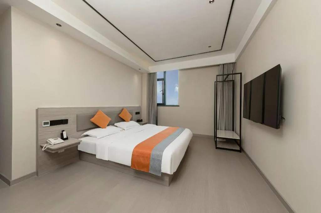 Bed in Shell Hotel Suzhou Zhangjiagang Jingang Town Central Plaza