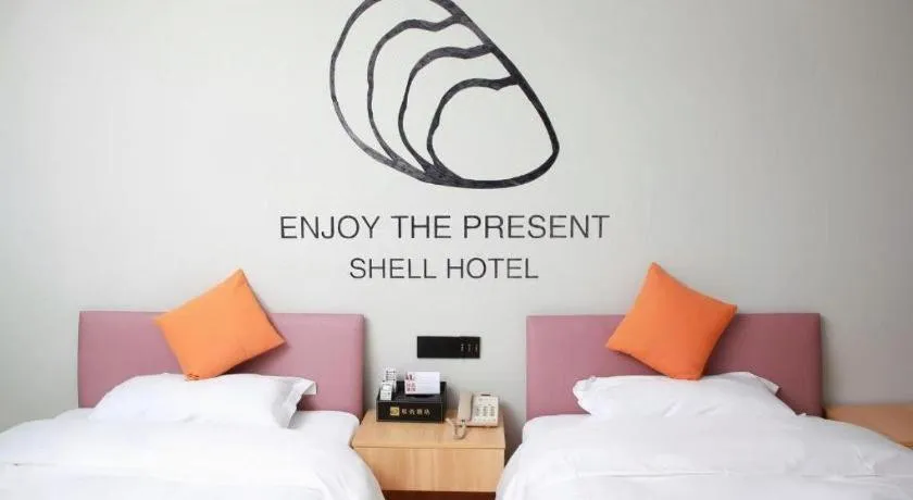 Bed in Shell Hotel Suzhou Zhangjiagang Jingang Town Central Plaza