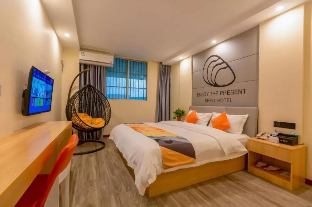 Bed in Shell Hotel Suzhou Zhangjiagang Jingang Town Central Plaza