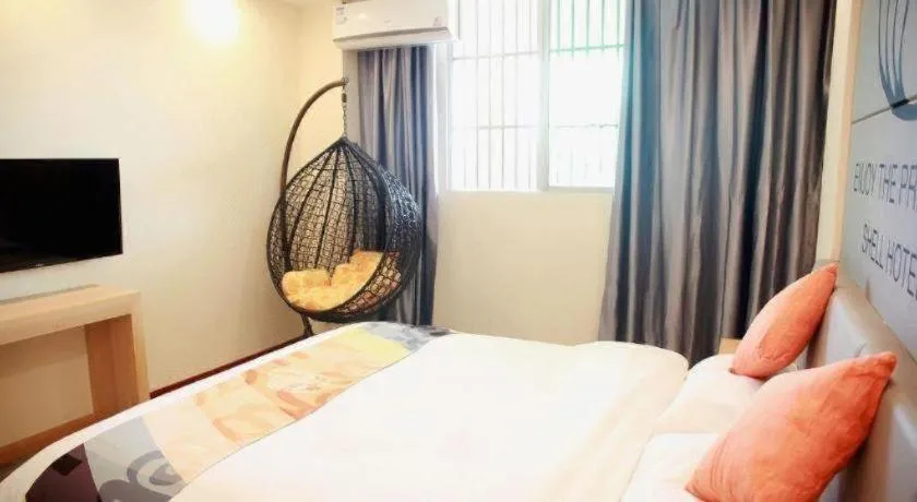 Bed in Shell Hotel Suzhou Zhangjiagang Jingang Town Central Plaza