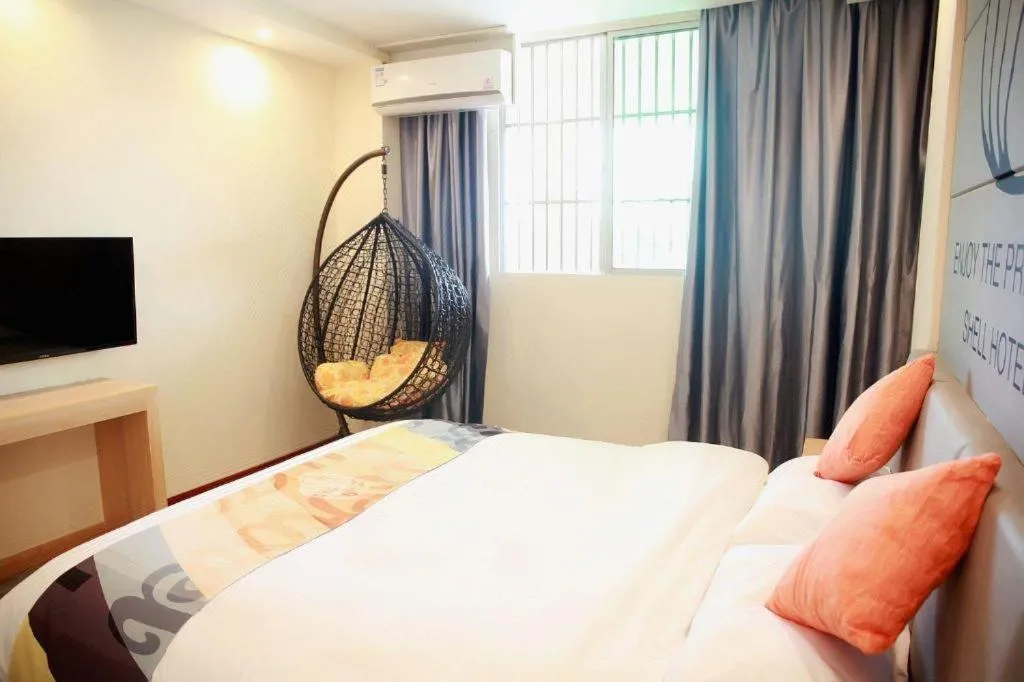 Bed in Shell Hotel Suzhou Zhangjiagang Jingang Town Central Plaza