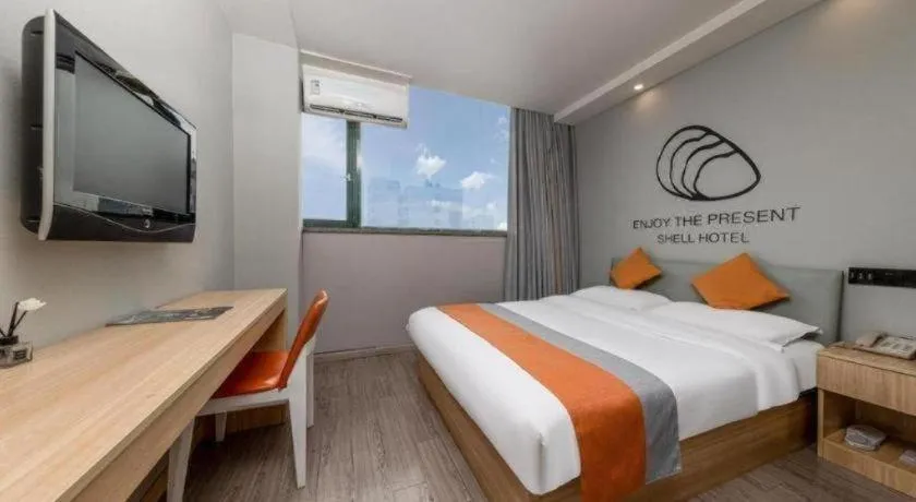 Bed in Shell Hotel Suzhou Zhangjiagang Jingang Town Central Plaza