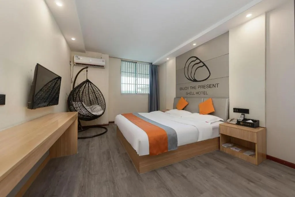 Bed in Shell Hotel Suzhou Zhangjiagang Jingang Town Central Plaza