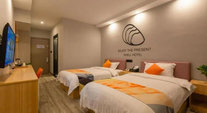 Bed in Shell Hotel Suzhou Zhangjiagang Jingang Town Central Plaza