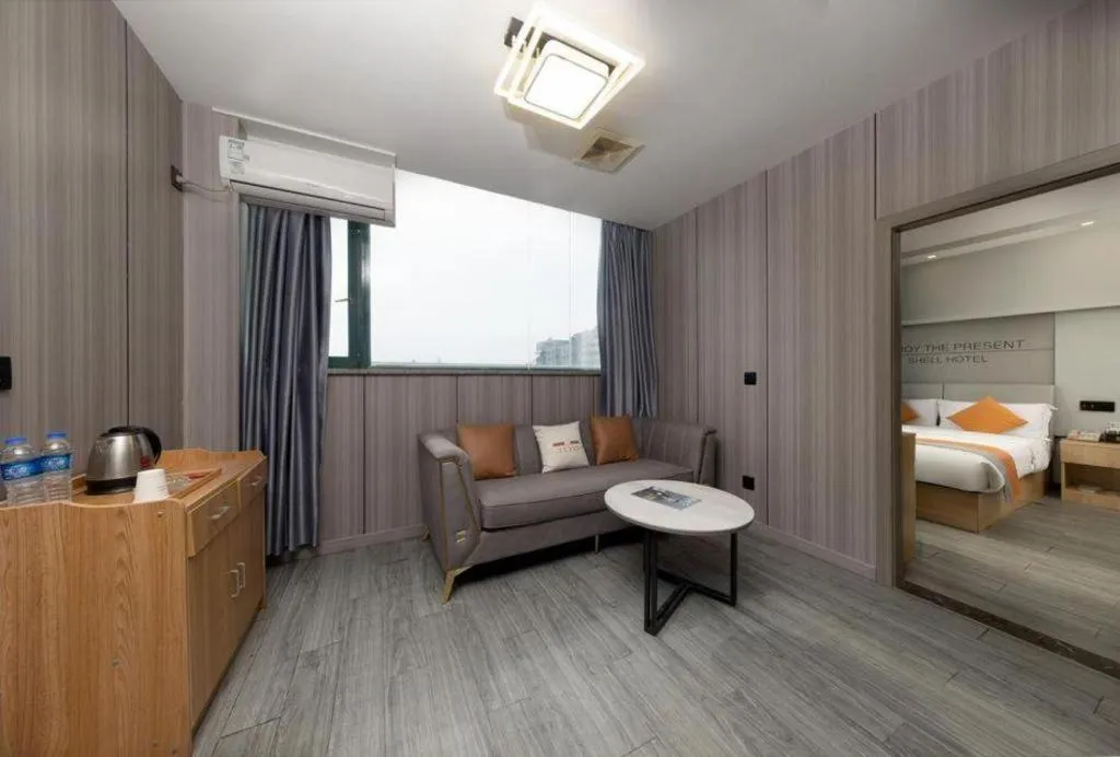 Bed in Shell Hotel Suzhou Zhangjiagang Jingang Town Central Plaza