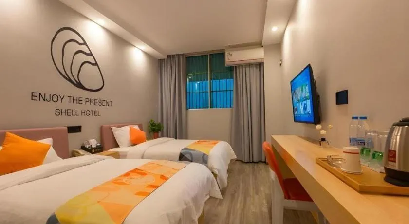 Bed in Shell Hotel Suzhou Zhangjiagang Jingang Town Central Plaza