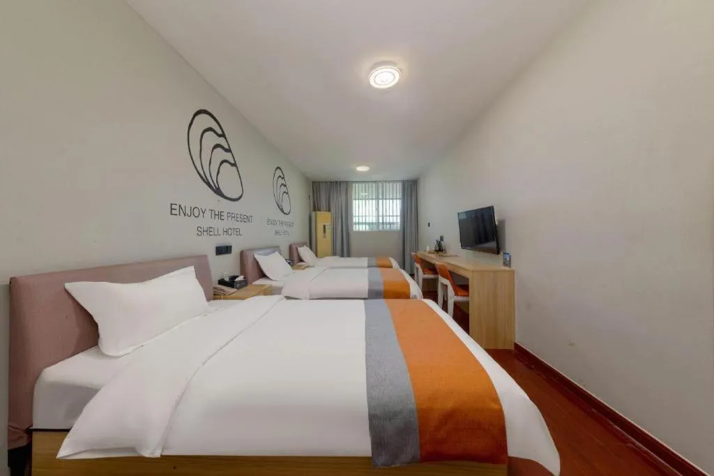 Bed in Shell Hotel Suzhou Zhangjiagang Jingang Town Central Plaza