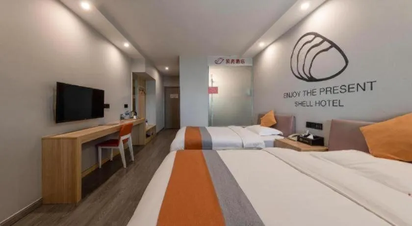 Bed in Shell Hotel Suzhou Zhangjiagang Jingang Town Central Plaza