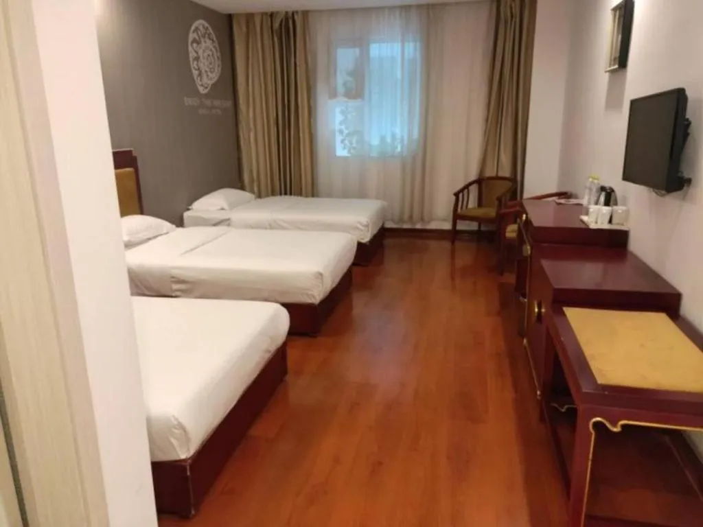 Bed in Shell Hotel Liaocheng Dongchang Xi Road Railway Station