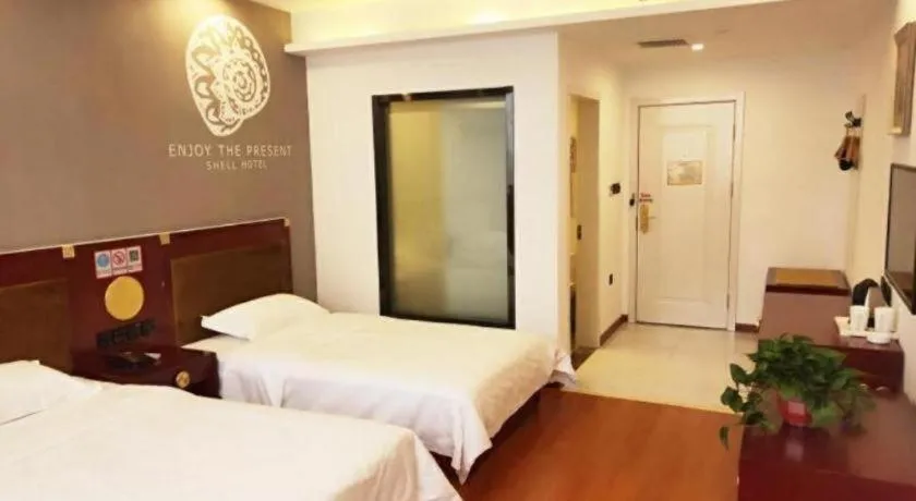 Bed in Shell Hotel Liaocheng Dongchang Xi Road Railway Station