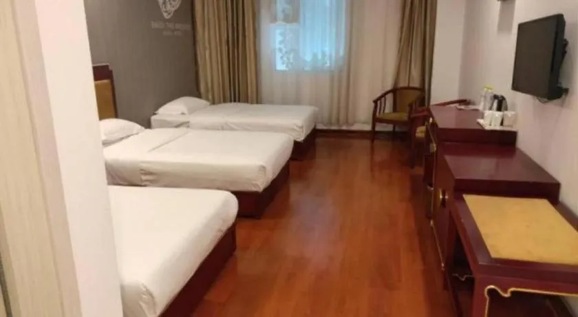 Bed in Shell Hotel Liaocheng Dongchang Xi Road Railway Station