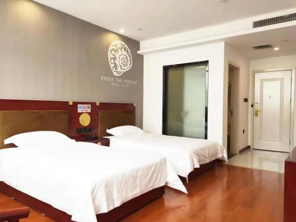 Bed in Shell Hotel Liaocheng Dongchang Xi Road Railway Station