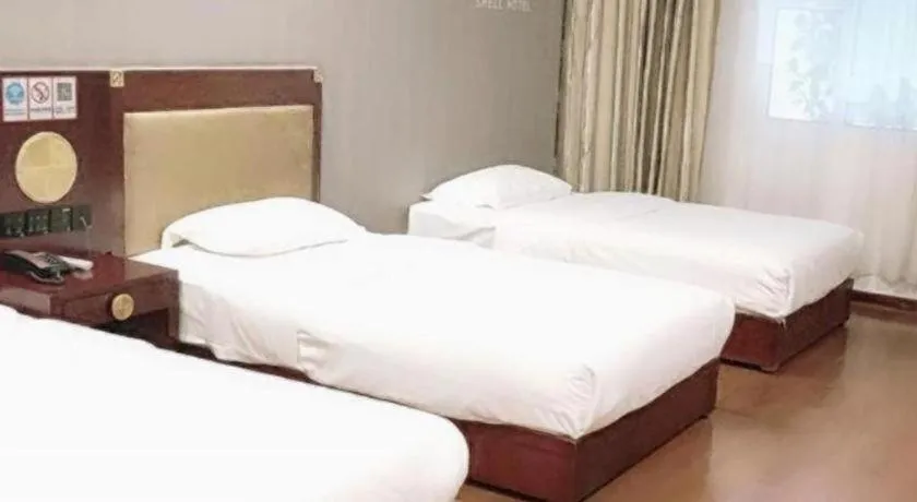 Bed in Shell Hotel Liaocheng Dongchang Xi Road Railway Station
