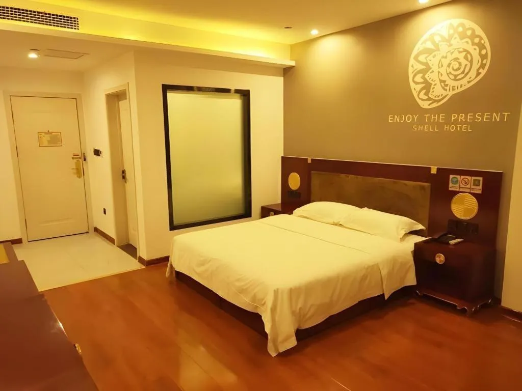 Bed in Shell Hotel Liaocheng Dongchang Xi Road Railway Station
