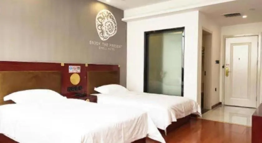 Bed in Shell Hotel Liaocheng Dongchang Xi Road Railway Station