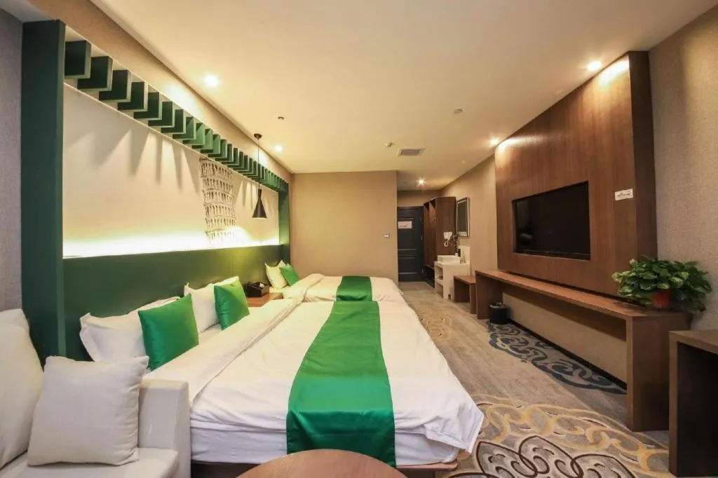 Bed in Shell Hotel Zhengzhou East High-Speed Railway Station Zhengdong Commerical Center