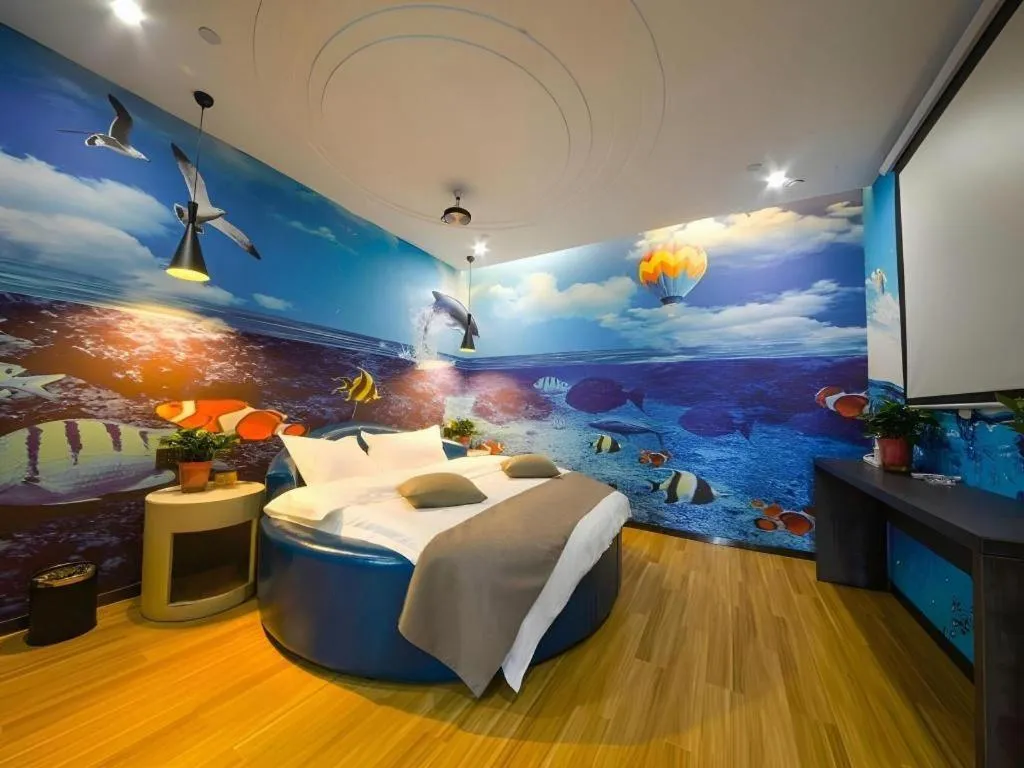 Bed in Shell Hotel Zhengzhou East High-Speed Railway Station Zhengdong Commerical Center