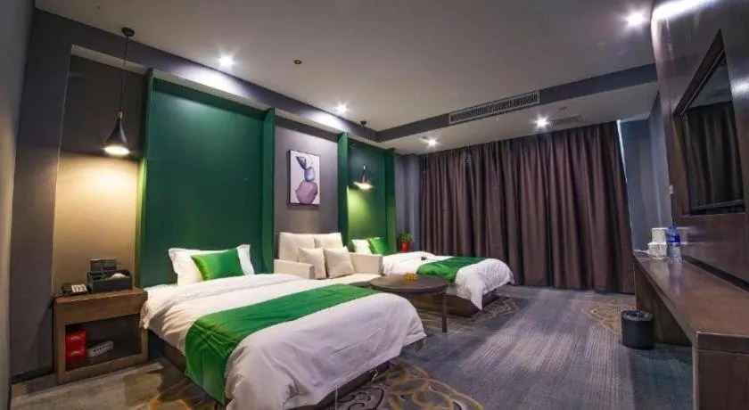 Bed in Shell Hotel Zhengzhou East High-Speed Railway Station Zhengdong Commerical Center