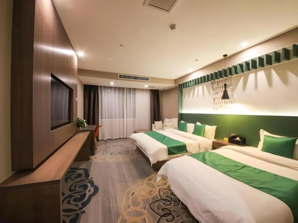 Bed in Shell Hotel Zhengzhou East High-Speed Railway Station Zhengdong Commerical Center