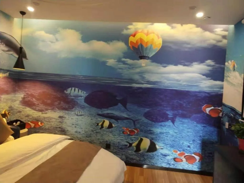 Bed in Shell Hotel Zhengzhou East High-Speed Railway Station Zhengdong Commerical Center