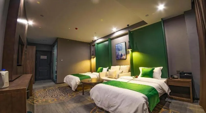 Bed in Shell Hotel Zhengzhou East High-Speed Railway Station Zhengdong Commerical Center