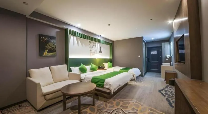 Bed in Shell Hotel Zhengzhou East High-Speed Railway Station Zhengdong Commerical Center