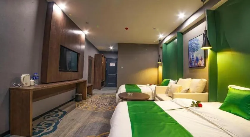 Bed in Shell Hotel Zhengzhou East High-Speed Railway Station Zhengdong Commerical Center