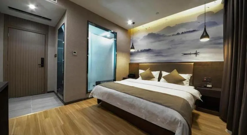 Bed in Shell Hotel Zhengzhou East High-Speed Railway Station Zhengdong Commerical Center