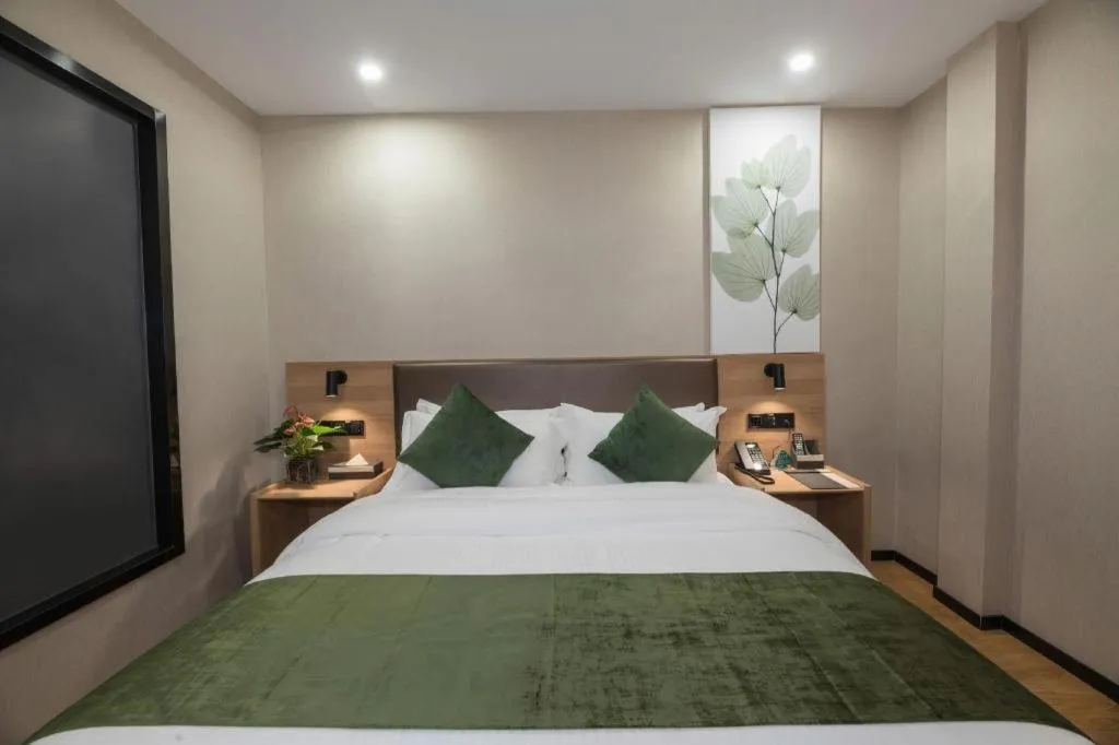 Bed in GreenTree Inn Express Zhangjiagang Hexing Town Shazhou Professional Institue of Technology