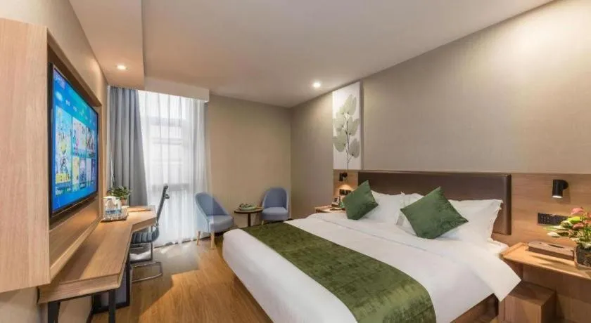 Bed in GreenTree Inn Express Zhangjiagang Hexing Town Shazhou Professional Institue of Technology