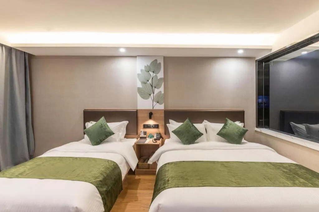 Bed in GreenTree Inn Express Zhangjiagang Hexing Town Shazhou Professional Institue of Technology