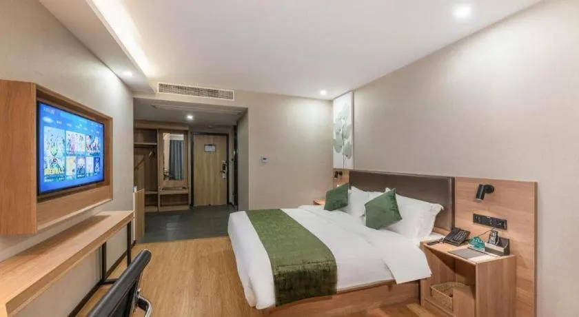 Bed in GreenTree Inn Express Zhangjiagang Hexing Town Shazhou Professional Institue of Technology