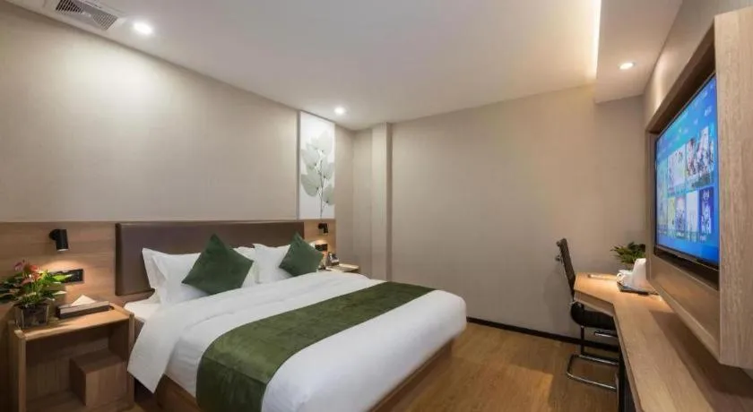 Bed in GreenTree Inn Express Zhangjiagang Hexing Town Shazhou Professional Institue of Technology