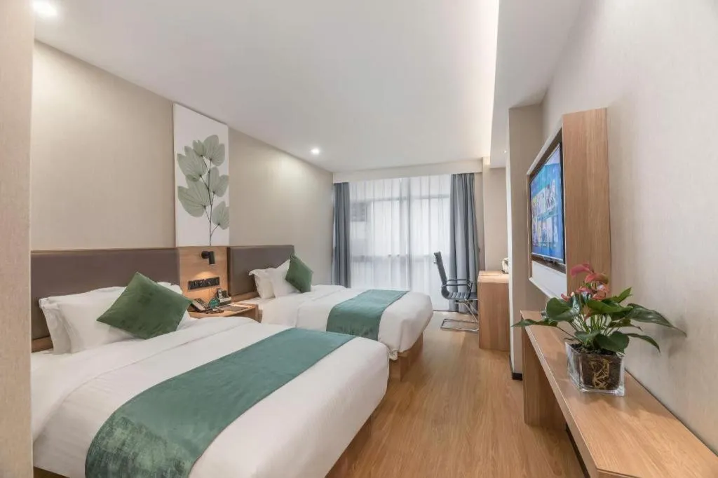 Bed in GreenTree Inn Express Zhangjiagang Hexing Town Shazhou Professional Institue of Technology