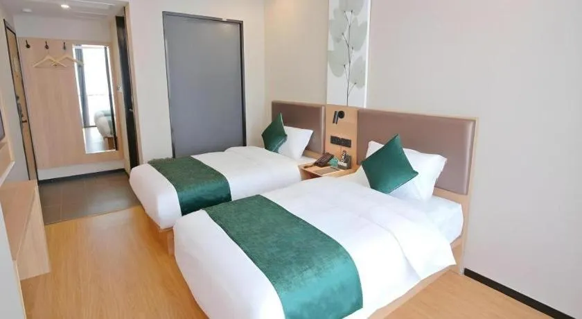 Bed in GreenTree Inn Express Zhangjiagang Hexing Town Shazhou Professional Institue of Technology
