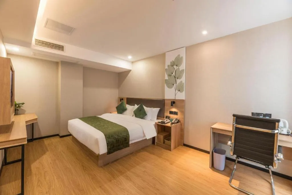 Bed in GreenTree Inn Express Zhangjiagang Hexing Town Shazhou Professional Institue of Technology