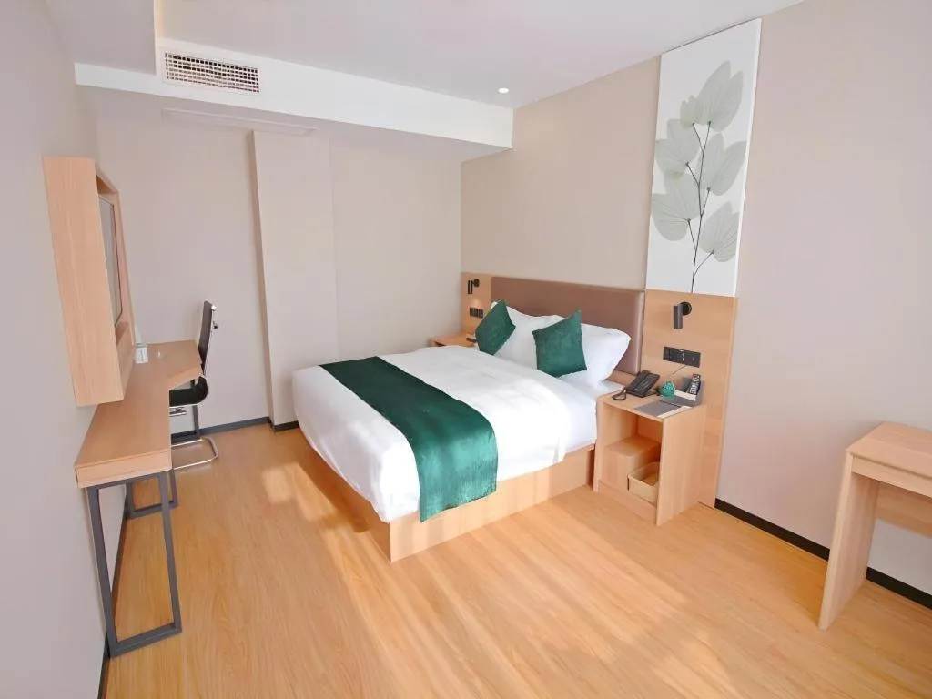 Bed in GreenTree Inn Express Zhangjiagang Hexing Town Shazhou Professional Institue of Technology