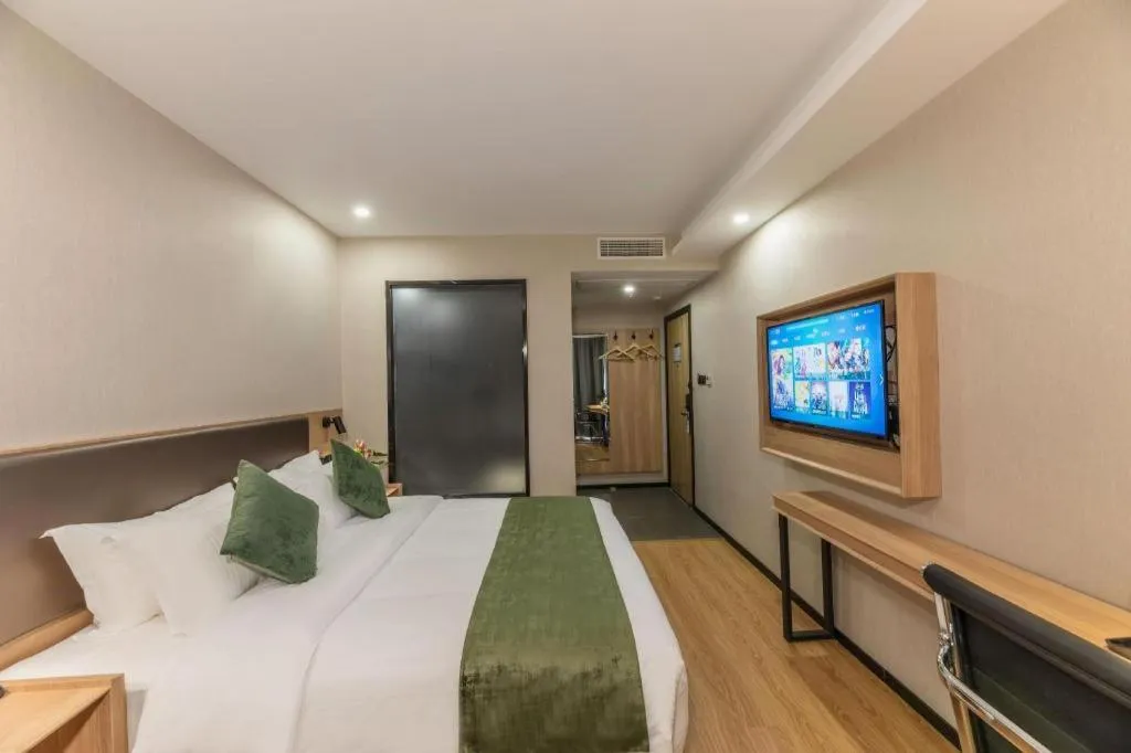Bed in GreenTree Inn Express Zhangjiagang Hexing Town Shazhou Professional Institue of Technology