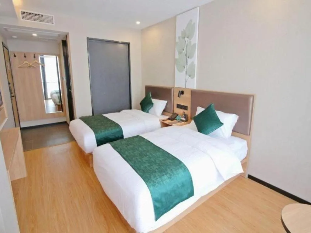 Bed in GreenTree Inn Express Zhangjiagang Hexing Town Shazhou Professional Institue of Technology