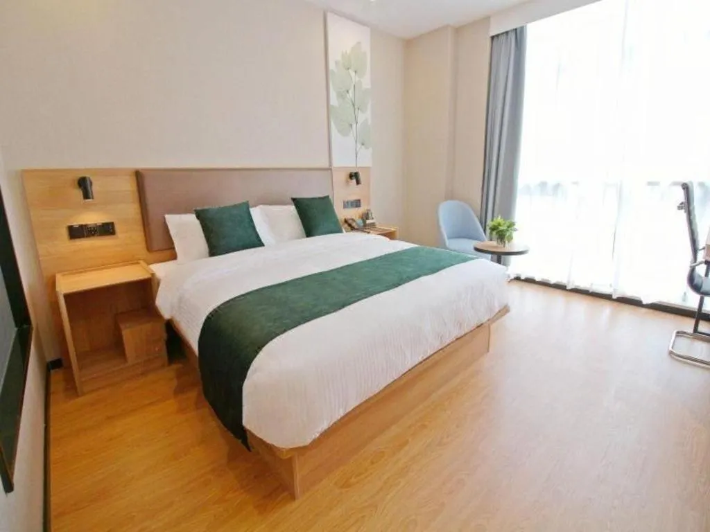 Bed in GreenTree Inn Express Zhangjiagang Hexing Town Shazhou Professional Institue of Technology