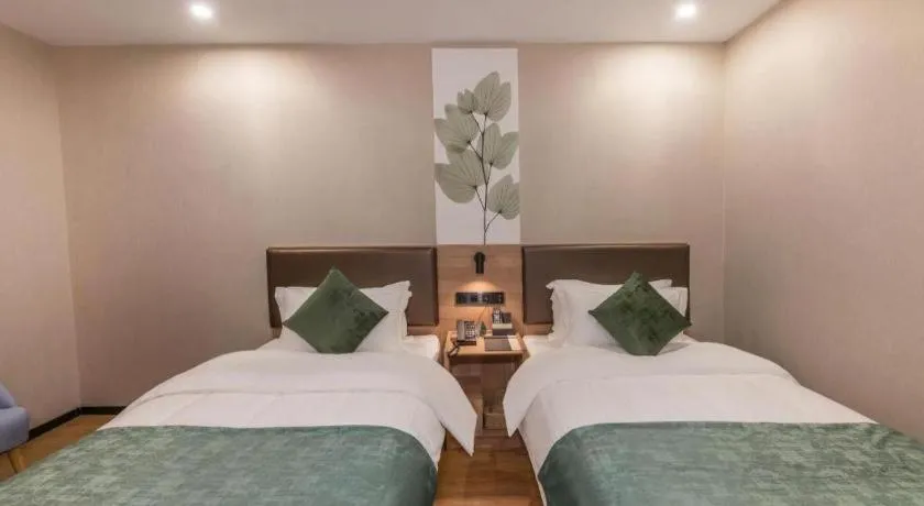 Bed in GreenTree Inn Express Zhangjiagang Hexing Town Shazhou Professional Institue of Technology