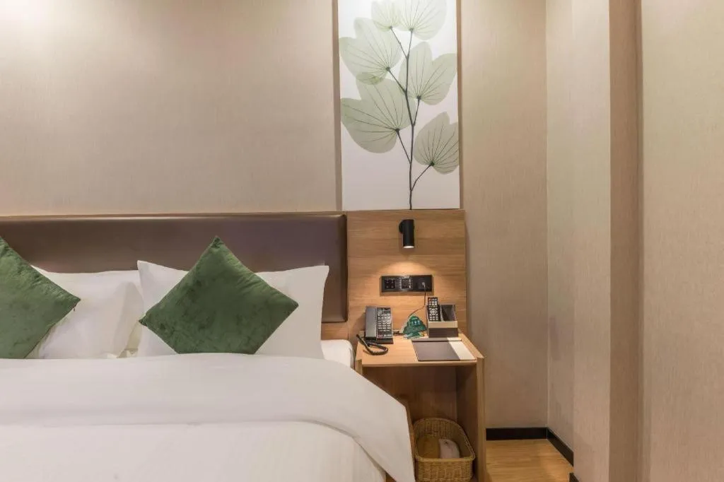 Bed in GreenTree Inn Express Zhangjiagang Hexing Town Shazhou Professional Institue of Technology