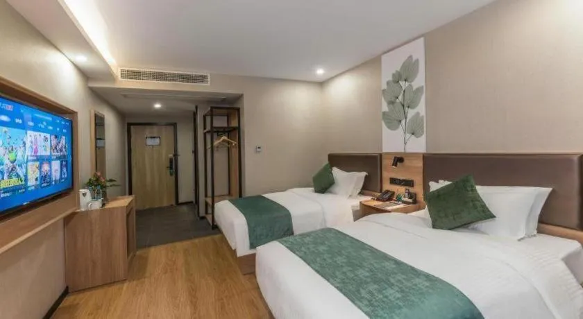 Bed in GreenTree Inn Express Zhangjiagang Hexing Town Shazhou Professional Institue of Technology