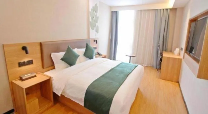 Bed in GreenTree Inn Express Zhangjiagang Hexing Town Shazhou Professional Institue of Technology