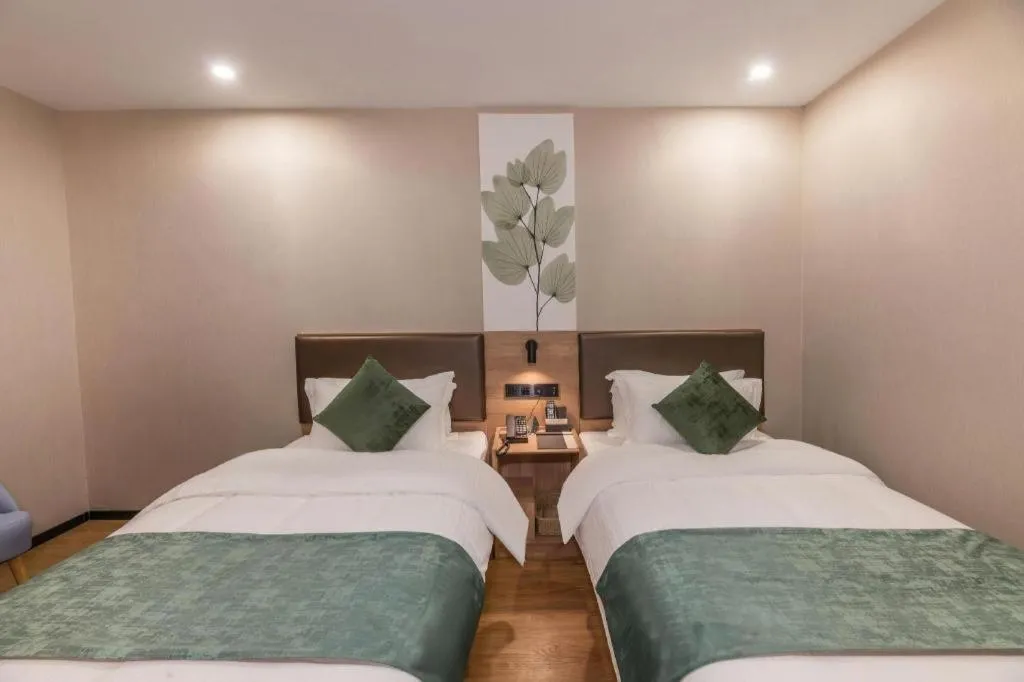 Bed in GreenTree Inn Express Zhangjiagang Hexing Town Shazhou Professional Institue of Technology