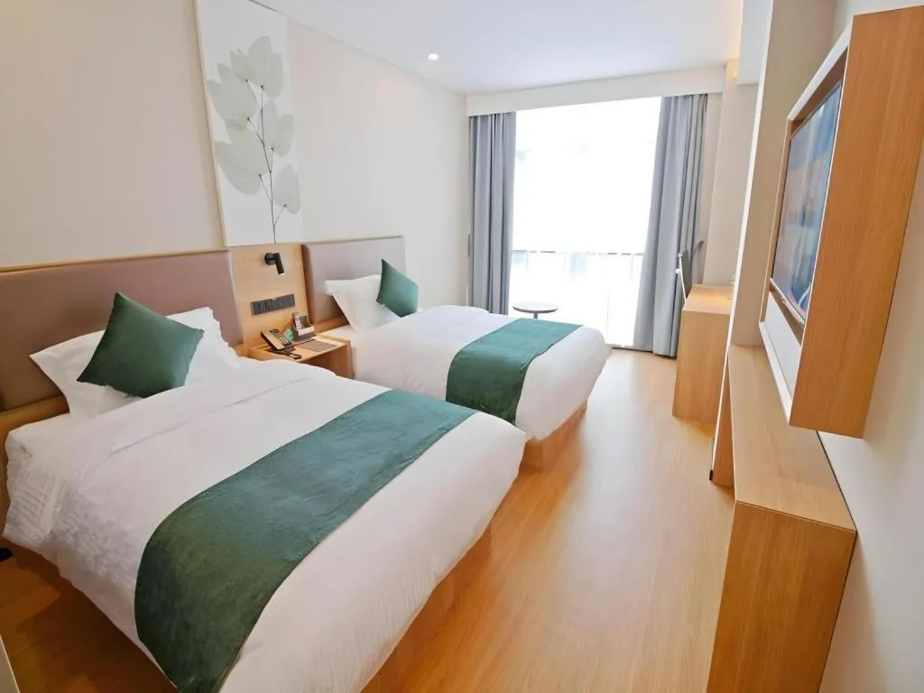 Bed in GreenTree Inn Express Zhangjiagang Hexing Town Shazhou Professional Institue of Technology