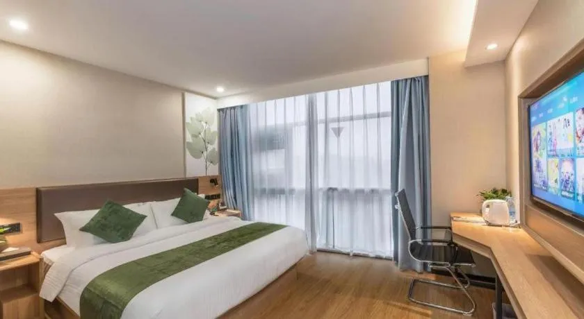 Bed in GreenTree Inn Express Zhangjiagang Hexing Town Shazhou Professional Institue of Technology