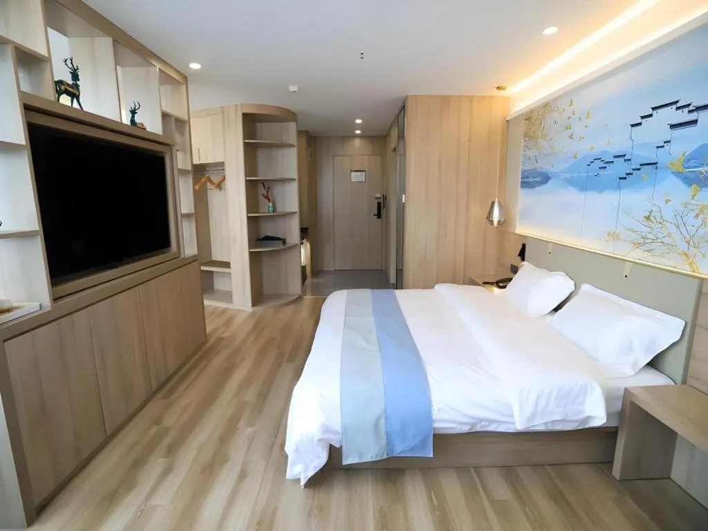 Bed in VX Hotel Jiangsu Taizhou Xinghua RT-Mart